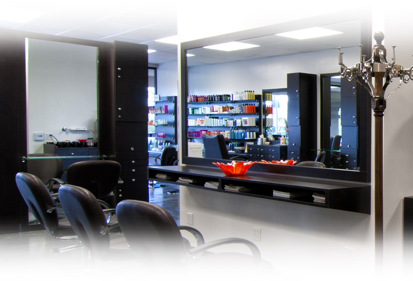 Dark natural wood and soft flourescent bulbs creates neutral interior lighting, so you see exactly how your color will look outside the salon